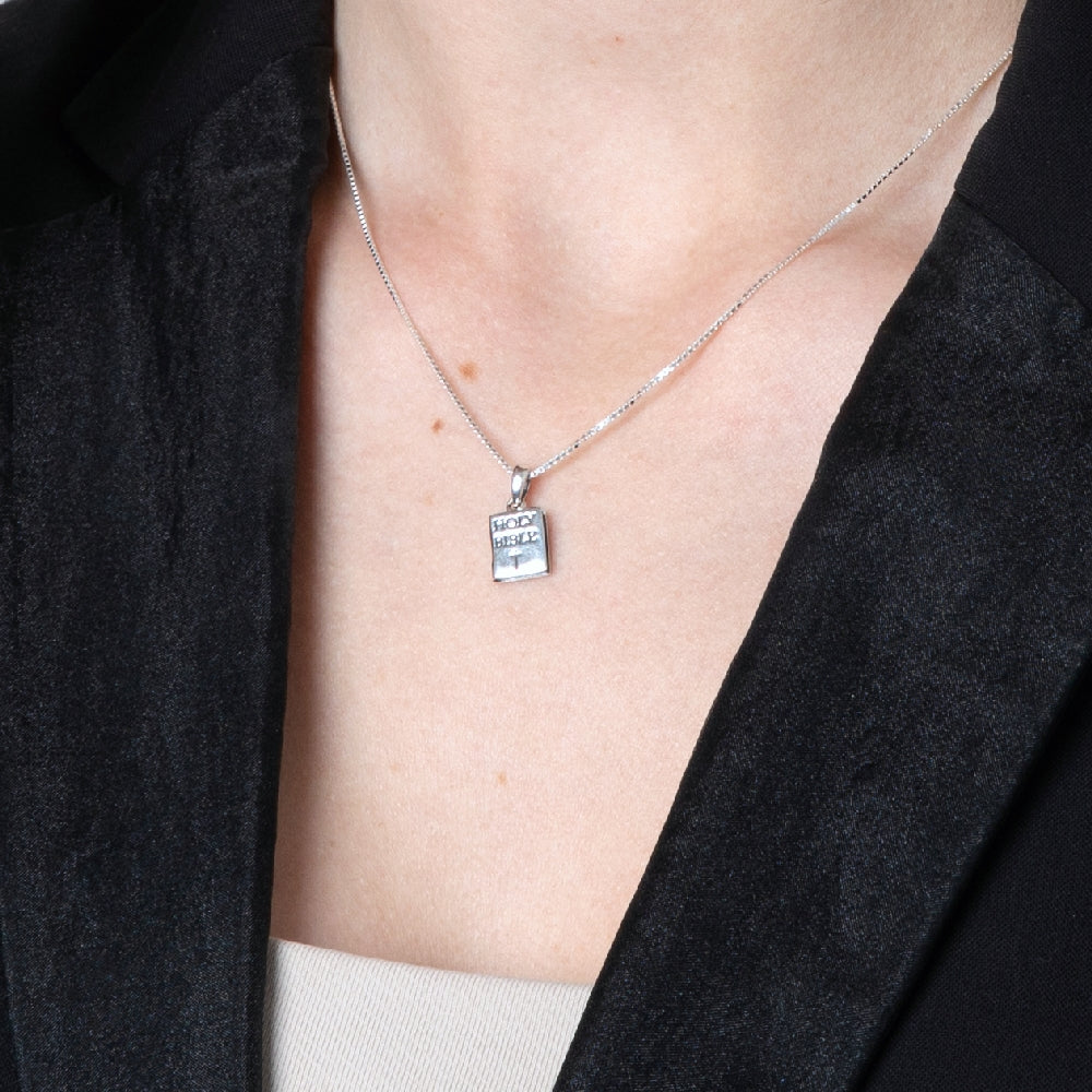 Holy Bible Pendant Necklace, Engraved Latin Cross, 925 Sterling Silver – shown worn, close-up