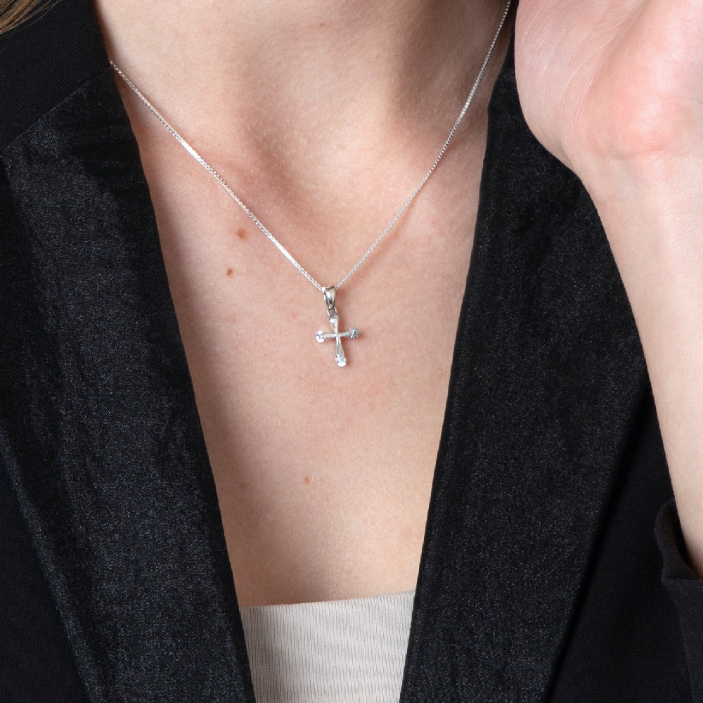 Cross Pendant Necklace, Cubic Zirconia Tips, 925 Sterling Silver – shown worn, close-up