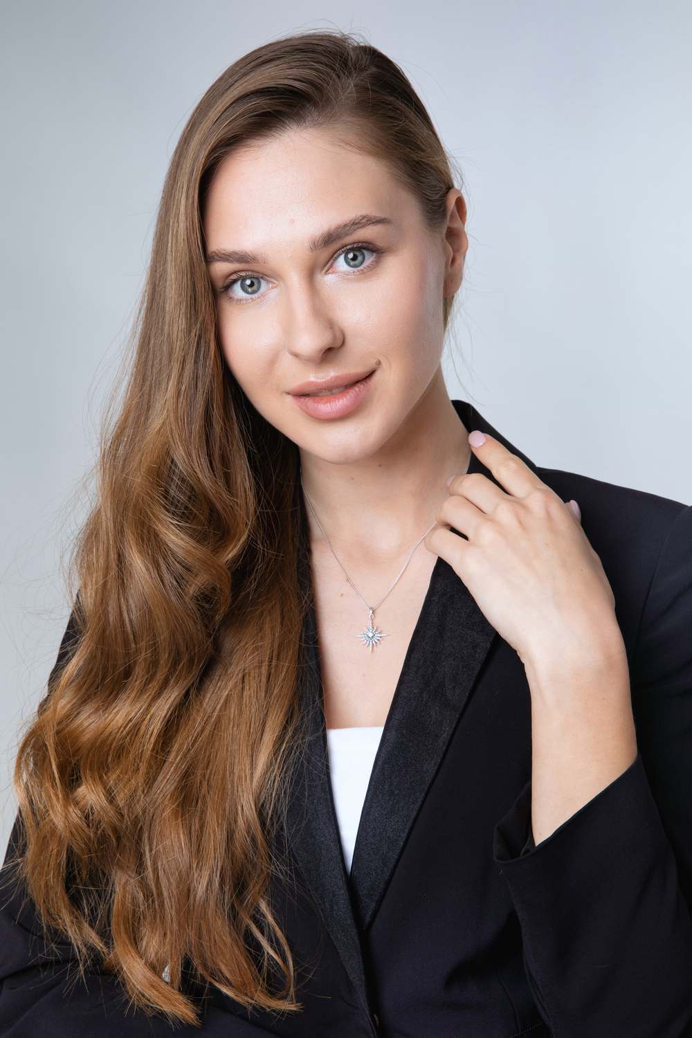 Star of Bethlehem Pendant Necklace in 925 Sterling Silver with Cubic Zirconia – shown worn