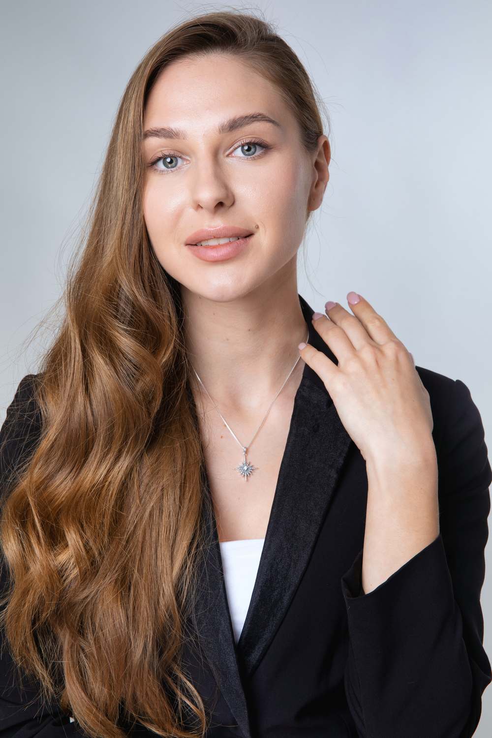 Star of Bethlehem Pendant Necklace in 925 Sterling Silver with Cubic Zirconia – shown worn