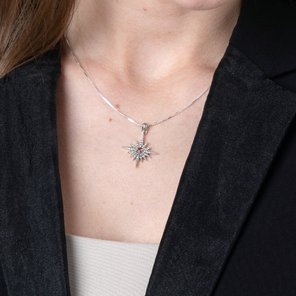 Star of Bethlehem Pendant Necklace in 925 Sterling Silver with Garnet – shown worn, close-up