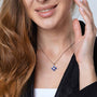 Blue Enamel Jerusalem Cross Pendant Necklace, CZ Center Stone, 925 Sterling Silver – shown worn, close-up