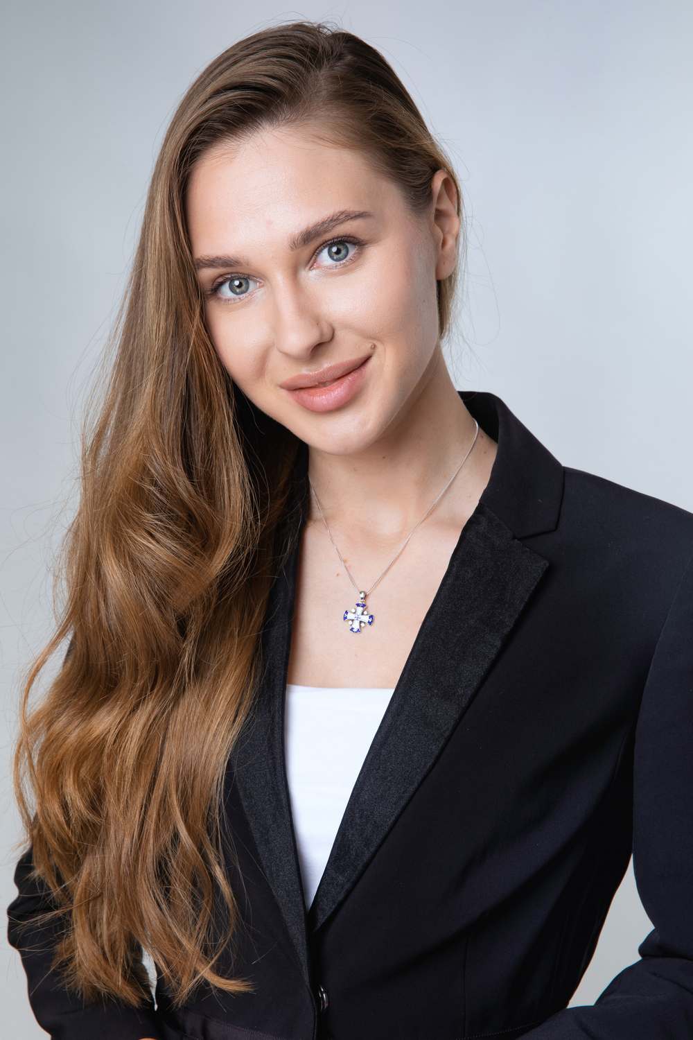 Blue and White Enamel Jerusalem Cross Pendant Necklace in 925 Sterling Silver with Cubic Zirconia – shown worn