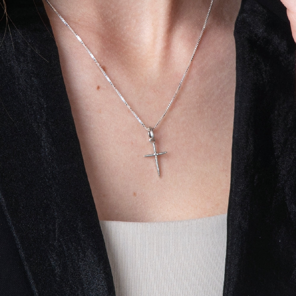 Dotted Cross Pendant Necklace, Slender Tapered Point, 925 Sterling Silver – shown worn, close-up
