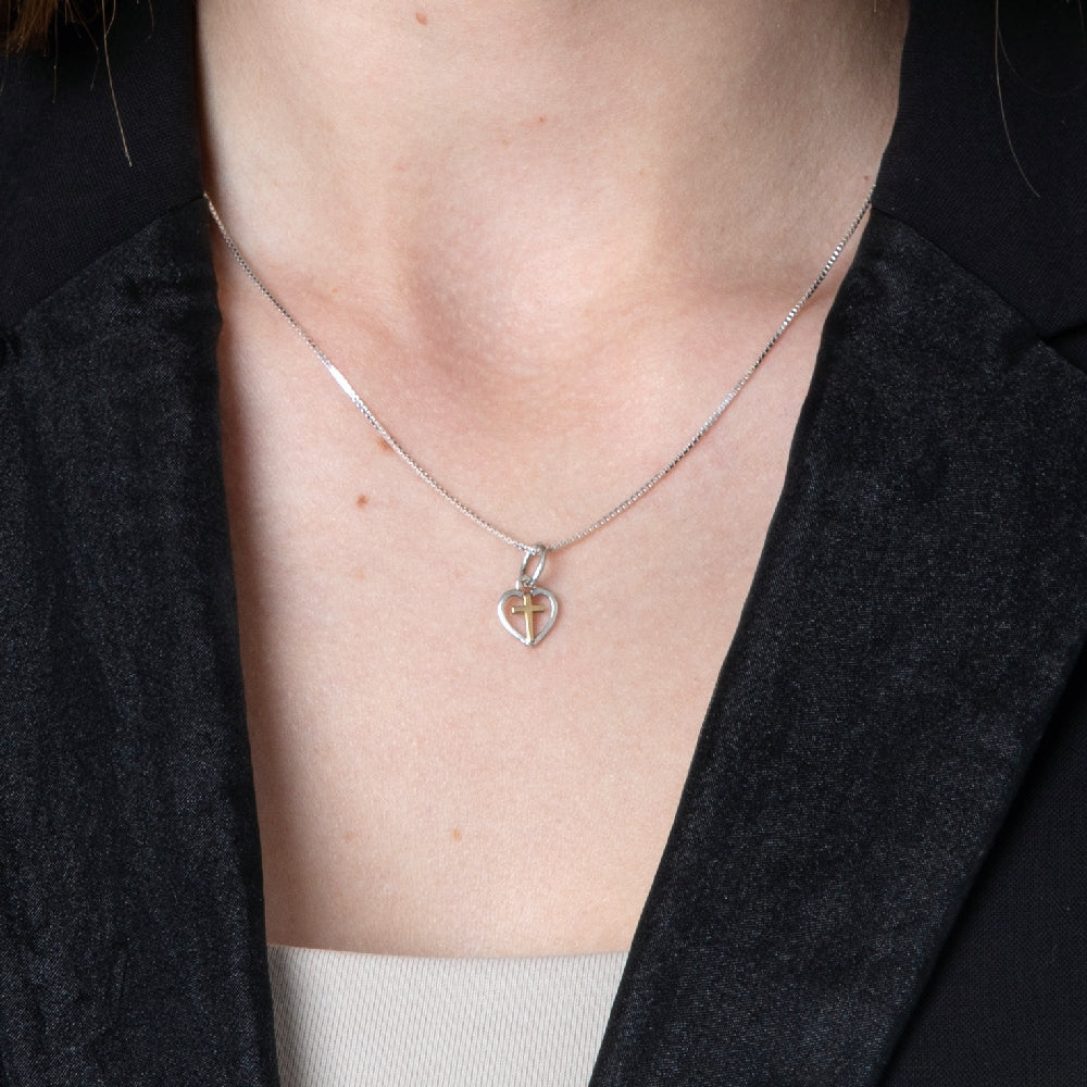 Cross in Heart Pendant Necklace in 925 Sterling Silver, Gold Plated – shown worn, close-up