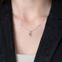Cross in Heart Pendant Necklace in 925 Sterling Silver, Gold Plated – shown worn, close-up