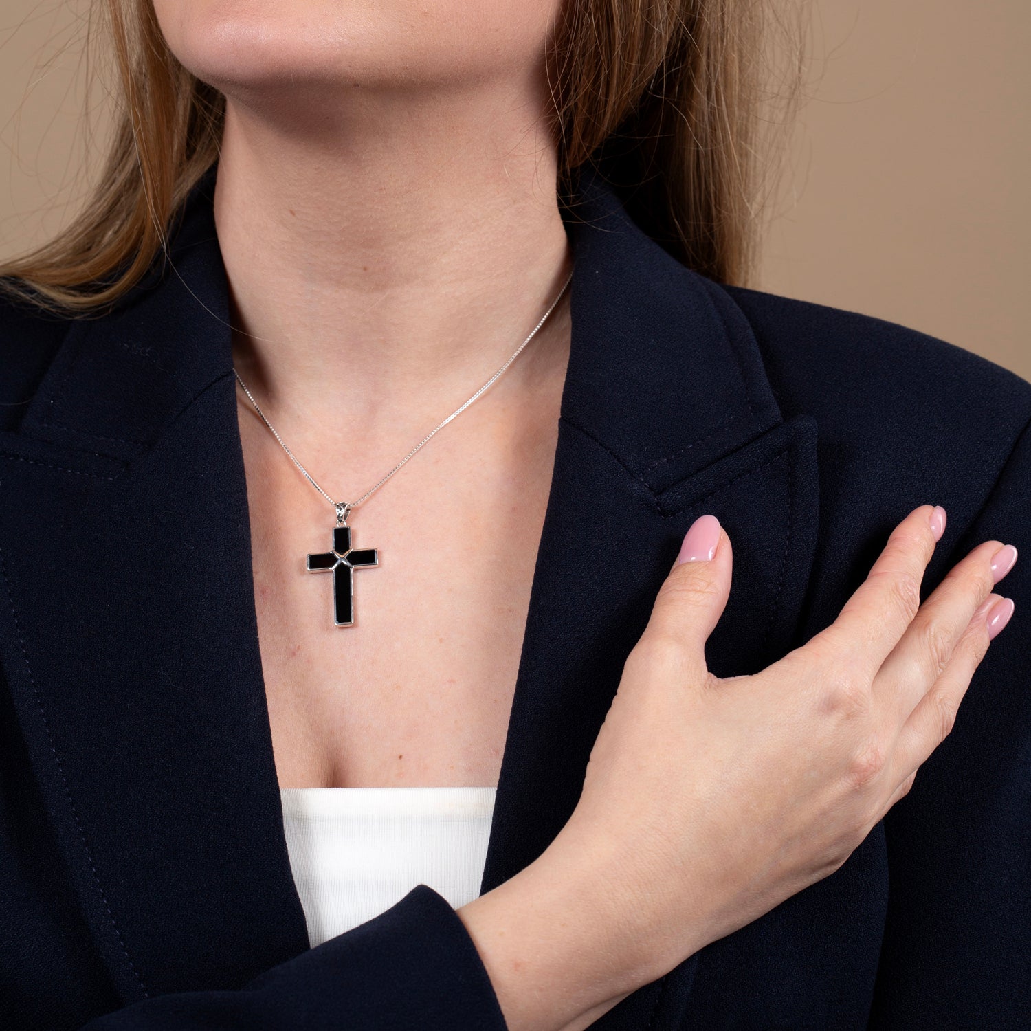 Black Onyx Cross Pendant Necklace with Star Detail, 925 Sterling Silver – shown worn, close-up