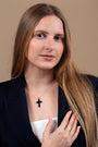 Black Onyx Cross Pendant Necklace, Segmented, 925 Sterling Silver – shown worn