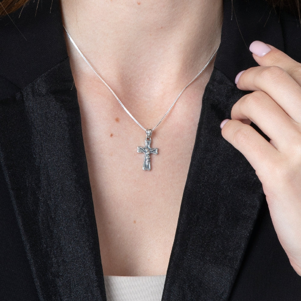 Crucifix Pendant Necklace in 925 Sterling Silver, Beaded Border – shown worn, close-up