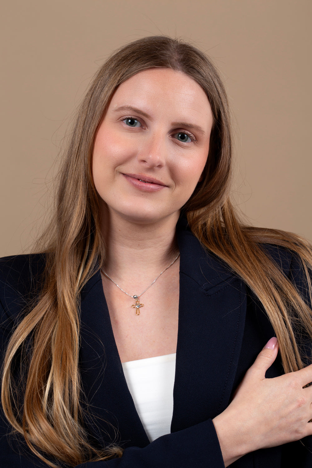 Cross Pendant Necklace, Gold Loop Outline with Silver Dove – shown worn
