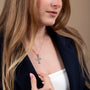 Cross Pendant Necklace, Chevron Texture, “God Bless” Inscription – shown worn, close-up