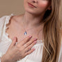 Virgin Mary Profile Pendant Necklace in 925 Sterling Silver with Blue Enamel – shown worn