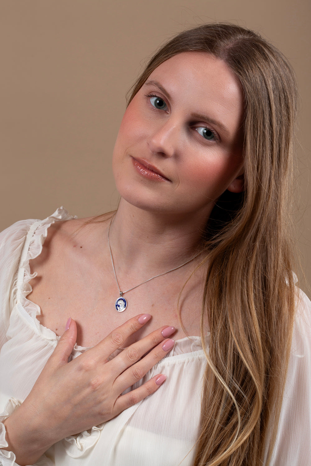 Virgin Mary Profile Pendant Necklace in 925 Sterling Silver with Blue Enamel – shown worn