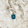 Roman Cross Pendant Necklace in 925 Sterling Silver with Eilat Stone – flat lay
