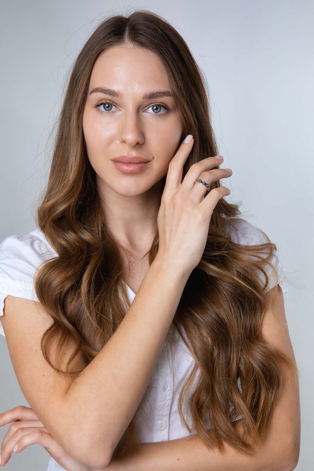 Portrait of a woman wearing the Jerusalem Cross rosary ring