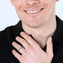 Man wearing the Jerusalem Cross decade rosary ring, close-up