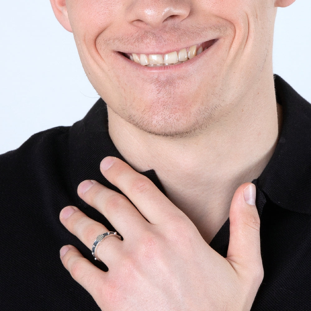Man wearing the Jerusalem Cross decade rosary ring, close-up