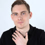 Man wearing the sterling silver Jerusalem Cross rosary ring