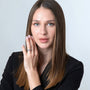 Woman in black wearing the sterling silver decade rosary ring