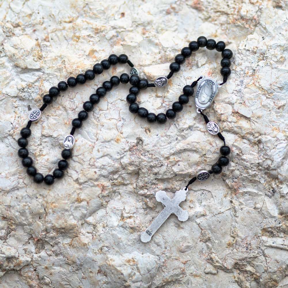 Black beaded rosary with Jordan River Water medallion and crucifix by Marina Jewelry