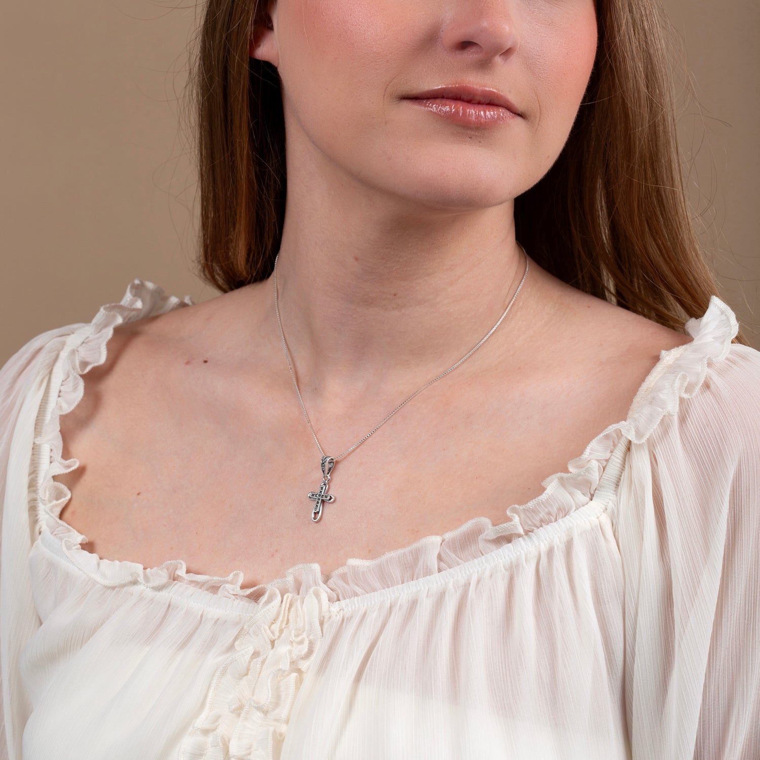 Looped Cross Pendant Necklace in 925 Sterling Silver, Marcasite – shown worn